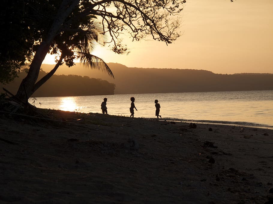 group of children near beach shore, vanuatu, sunset, ocean, sea