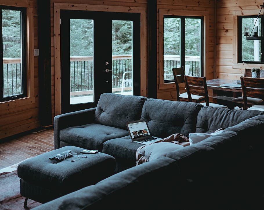 Working from home, laptop computer on sectional sofa in home HD wallpaper