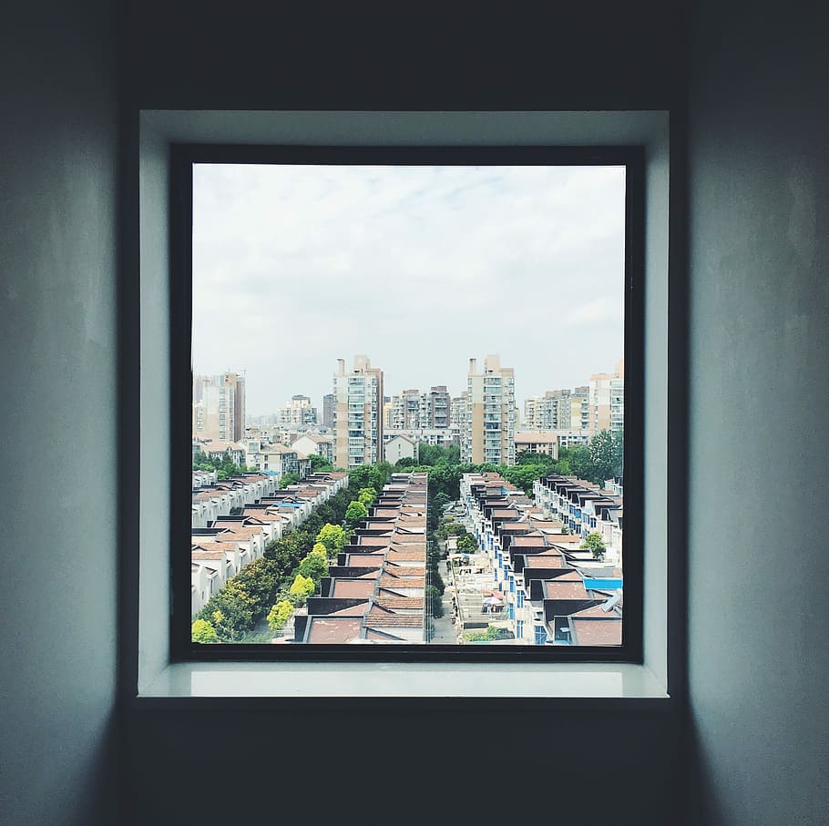 interior photography of opened window, photo of city buildings HD wallpaper