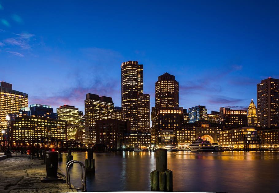 aerial photography of skyscraper at night time, photography of high-rise building during night time HD wallpaper
