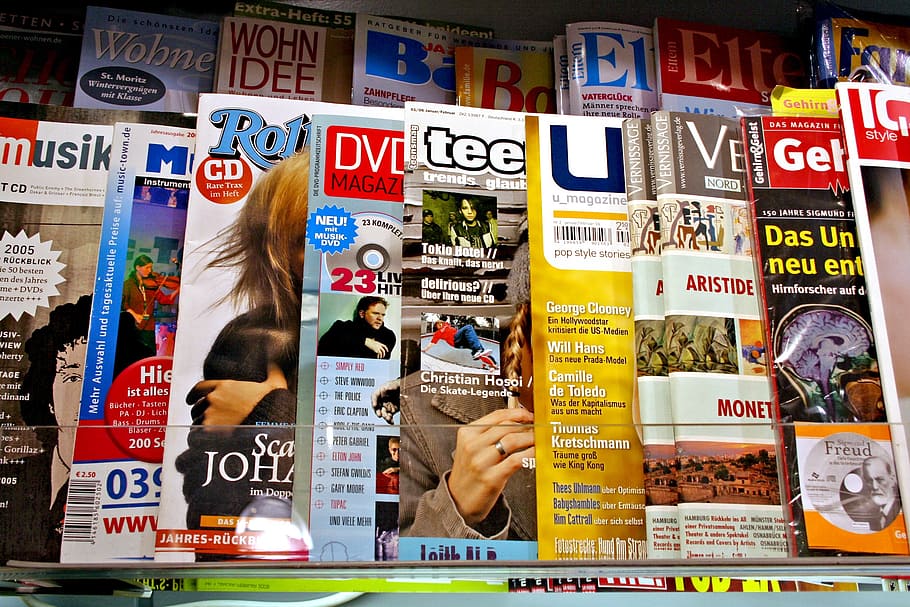 closeup photo of assorted-title magazines, journalism, press