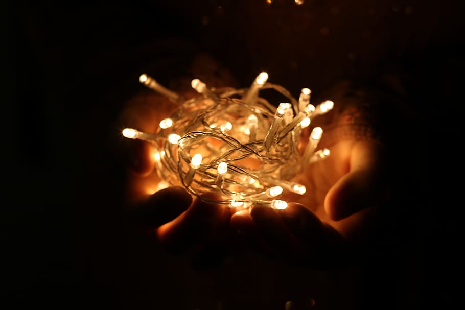 Person Showing White String Lights during Nightime, abstract HD wallpaper
