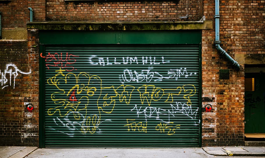 green shutter door, callum, hill, sprayed, black, roller, store