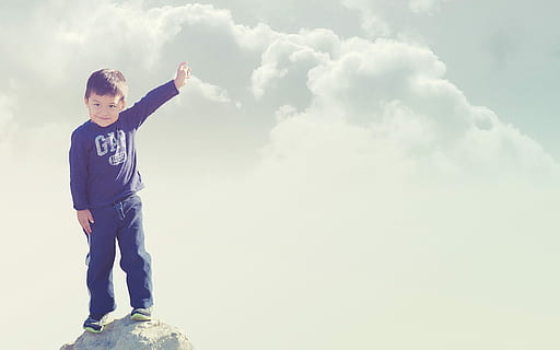 boy in black Gap sweatshirt and black bottoms standing on top of he cliff HD wallpaper