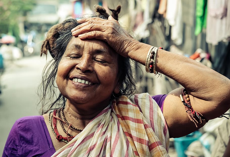 closeup photo of smiling woman holding her forehead, City of Joy, HD wallpaper