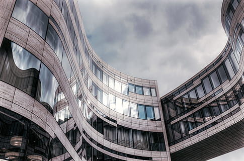gray high rise building low angle photography, low-angle photograph of glass window on building HD wallpaper