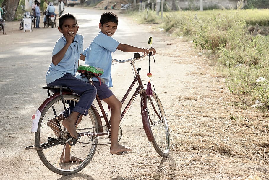 HD wallpaper two boy riding on red step through bicycle during