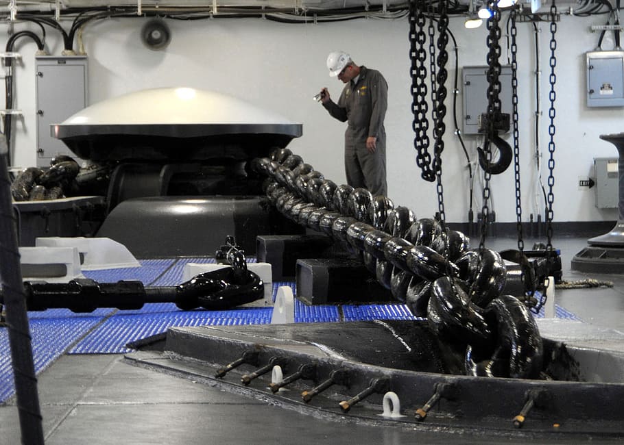 person standing near black steel chain, anchor, ship, man, inspecting HD wallpaper