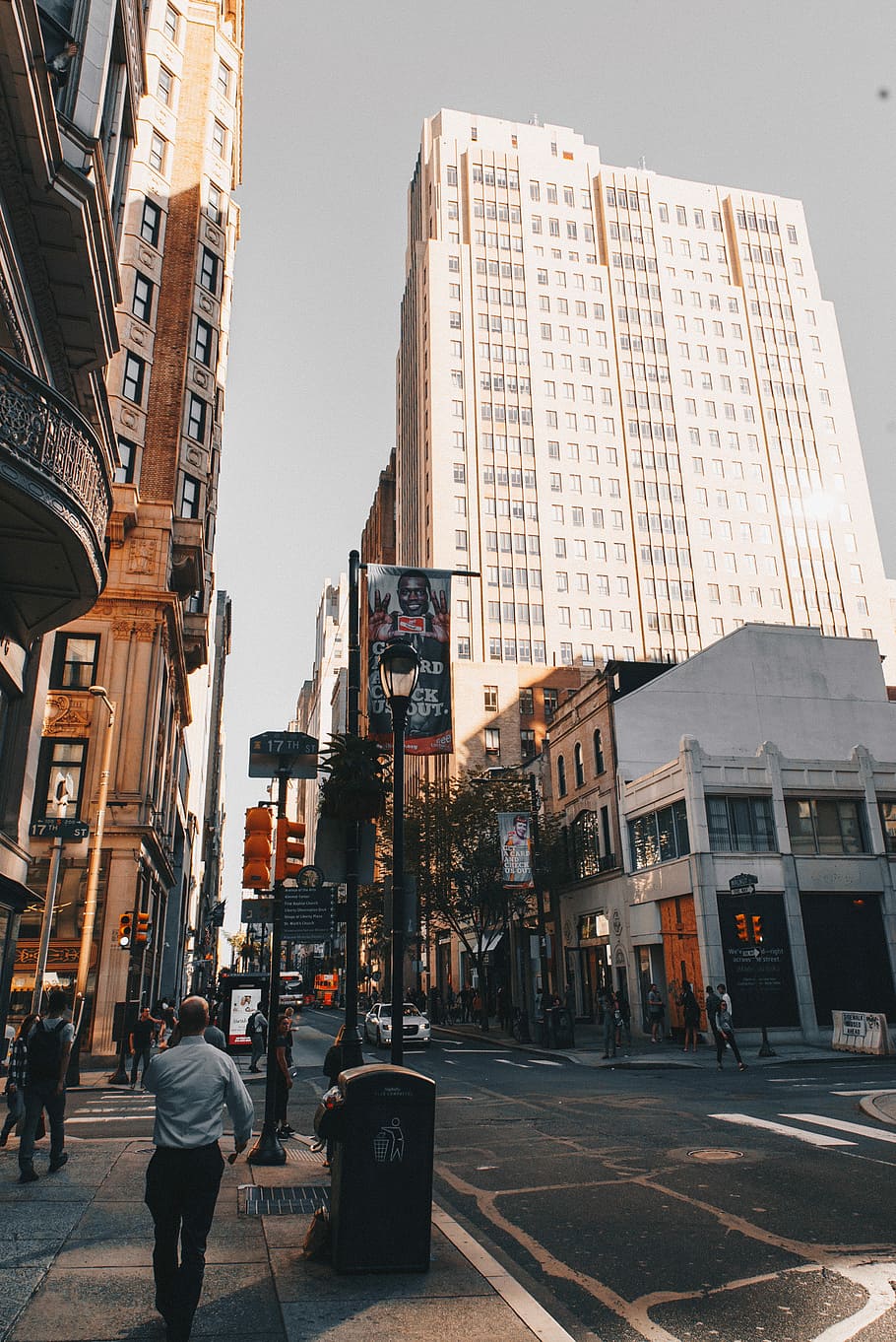 people walking on road side surrounded by high-rise buildings during daytime, city street and buildings HD wallpaper