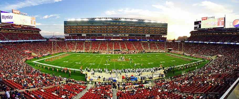 American football stadium field with spectator, athletes, audience