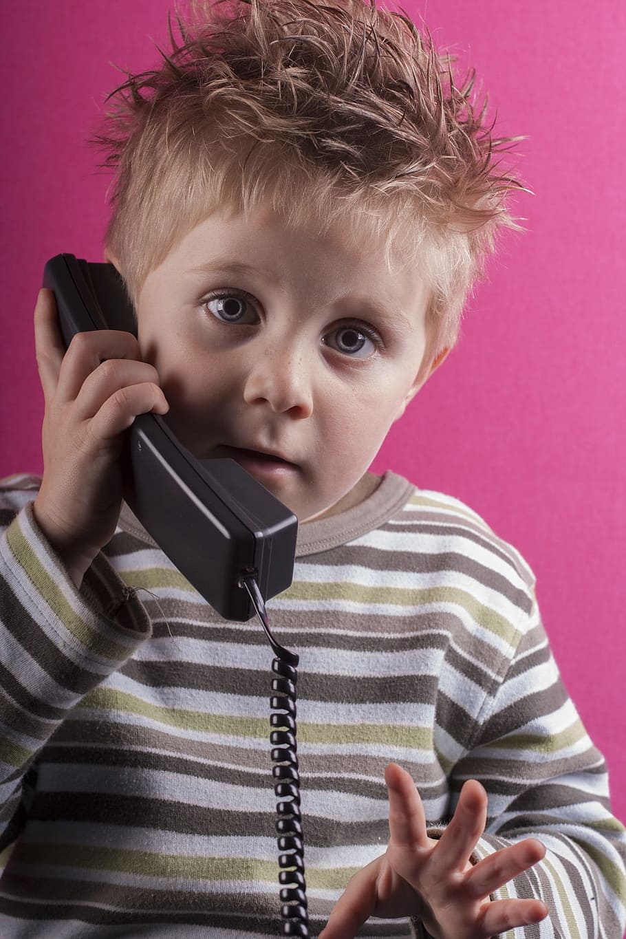 boy taking call near pink wall, learning, telephone, to call