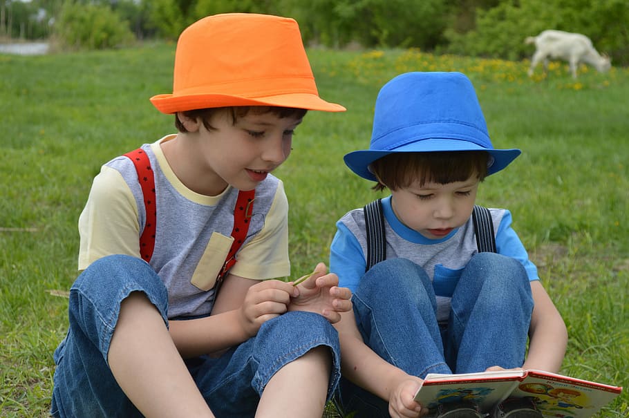 HD wallpaper: two kids wearing orange blue fedora hats sitting grass | Wallpaper Flare