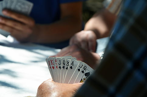 cards-game-hand-holding-thumbnail.jpg