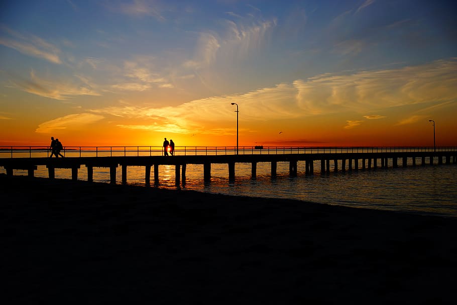 silhouette of people walking on bridge, photo of sea dock, persons HD wallpaper