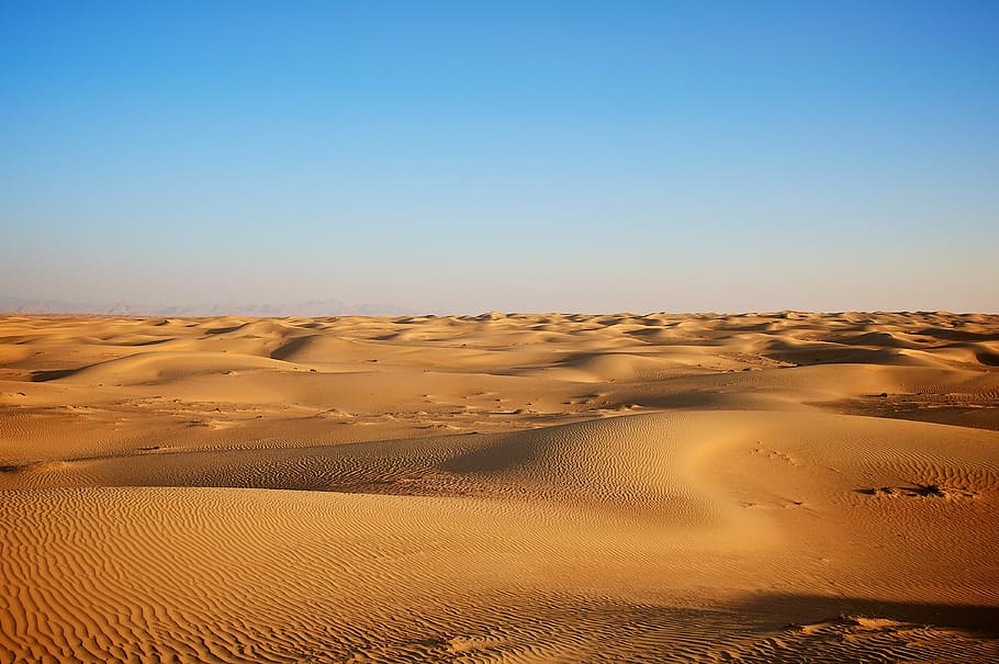 vast desert, brown sand under blue sky, dune, landscape, hot