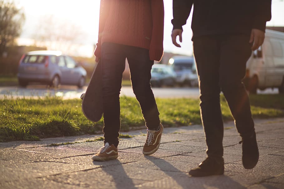 two men walking on pathway, pedestrians, sidewalk, city, sunlight HD wallpaper