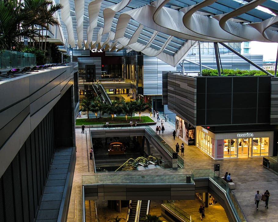 view of mall interior, group of people standing inside concrete building interior HD wallpaper