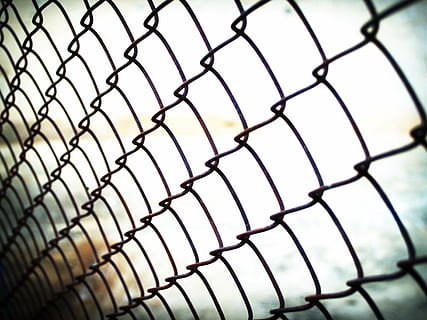 bokeh photography of black cyclone fence, net, metallic, isolated HD wallpaper