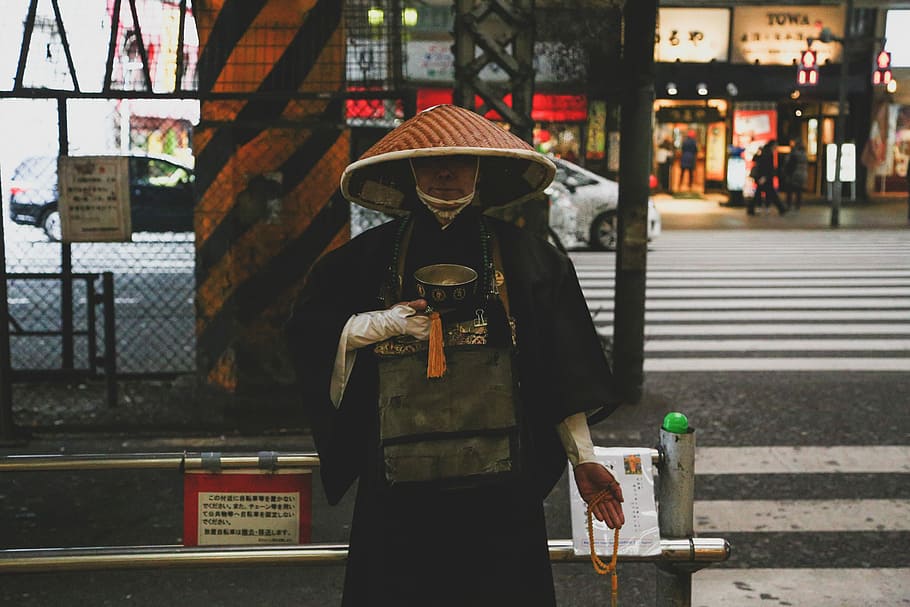 Chinese man walking on road, man wearing brown hat standing near road, HD wallpaper