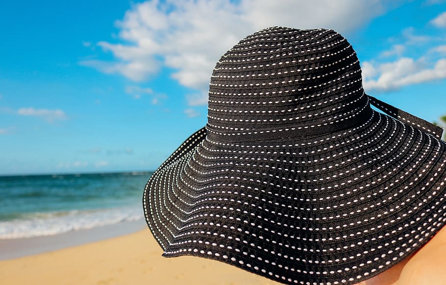 selective focus photography of black and white sunhat, person HD wallpaper