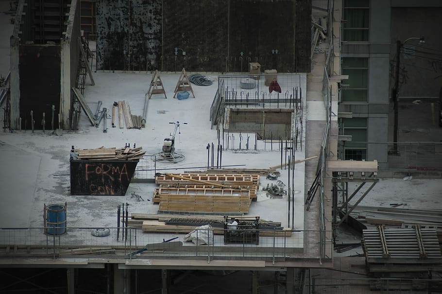 concrete building photo, photo of pile of wood plank and scaffold HD wallpaper