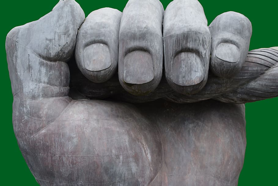 gray concrete hand ornament, fingers, fist, fingernails, green thumb