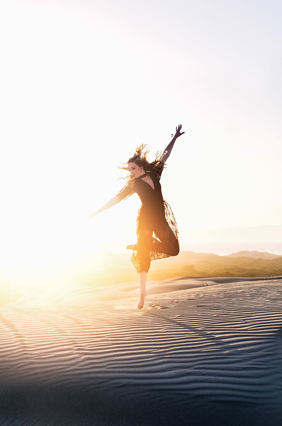 woman walking on desert during sunset, woman jumping on desert field during sunset HD wallpaper