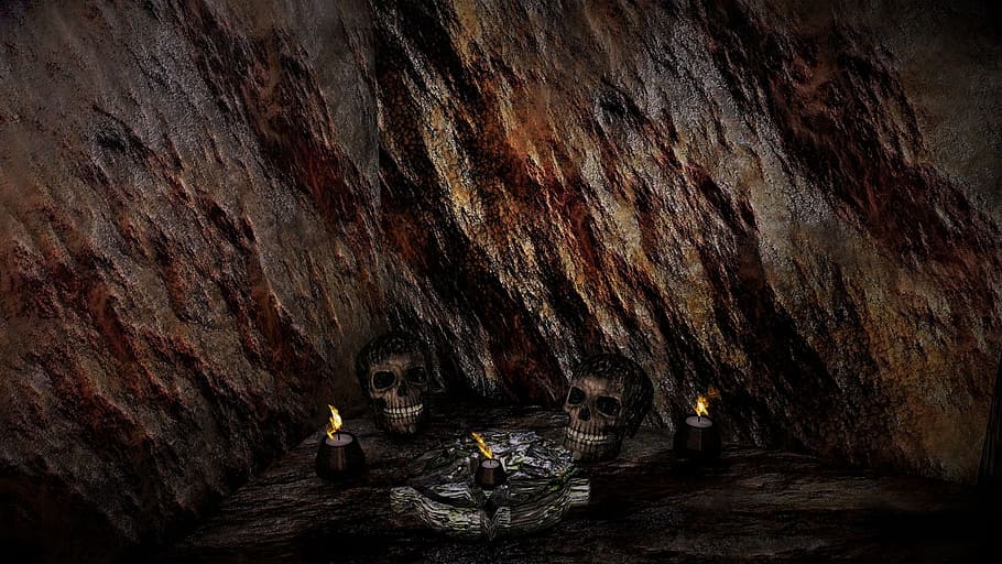 two skull miniatures beside lighted candles, cave, stone, skull and crossbones HD wallpaper