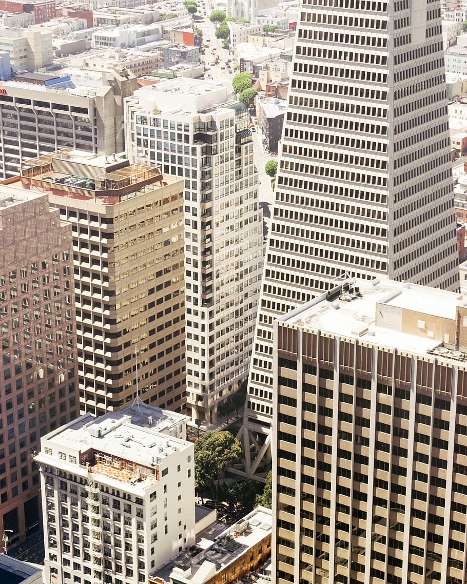 white and beige concrete buildings during daytime, skyscraper HD wallpaper