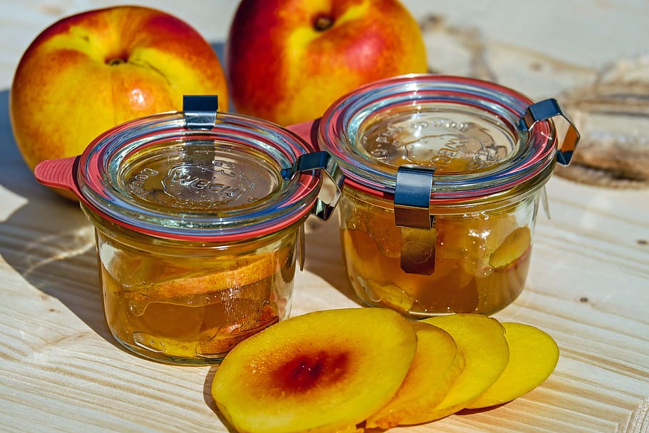 sliced peach fruit beside clear glass jars, jam, nectarine HD wallpaper