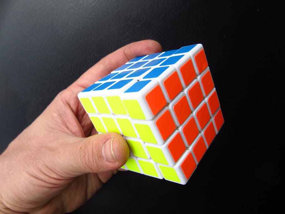 magic cube, hand, puzzle, toys, denksport, colorful, four, difficult HD wallpaper