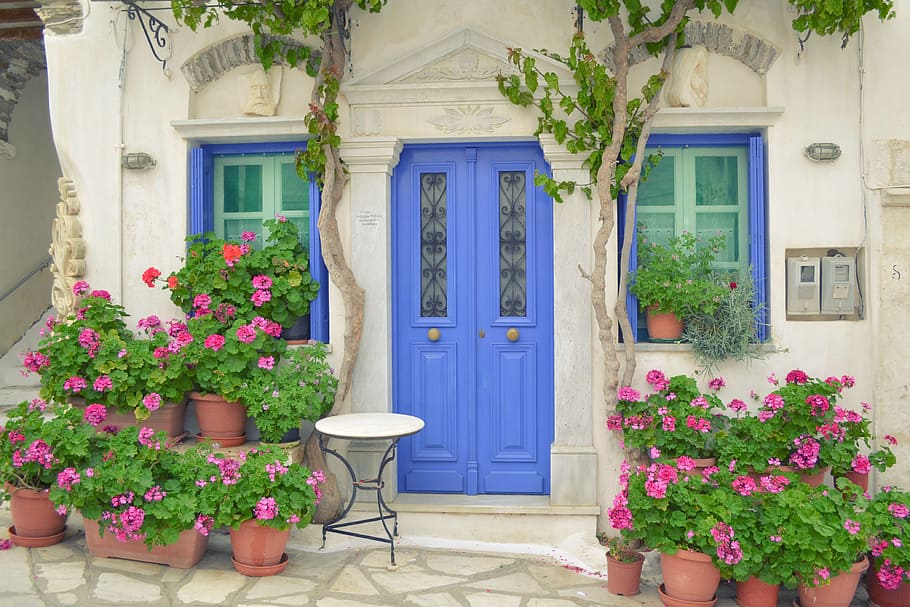 closed blue side-by-side door, greek island door, tinos island pyrgos