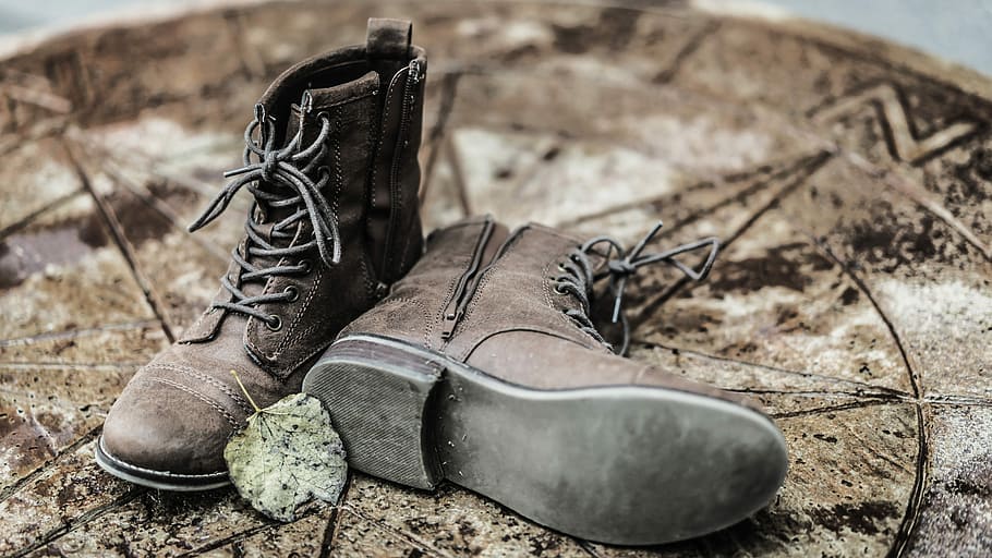 pair of brown side-zip lace-up boots on brown ground, shallow focus photography of brown leather work boots, HD wallpaper