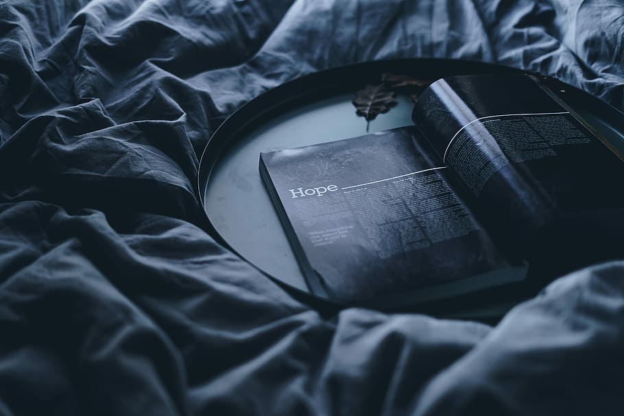 black book on gray textile, Hope magazine on black wooden tray on black fabric textile HD wallpaper