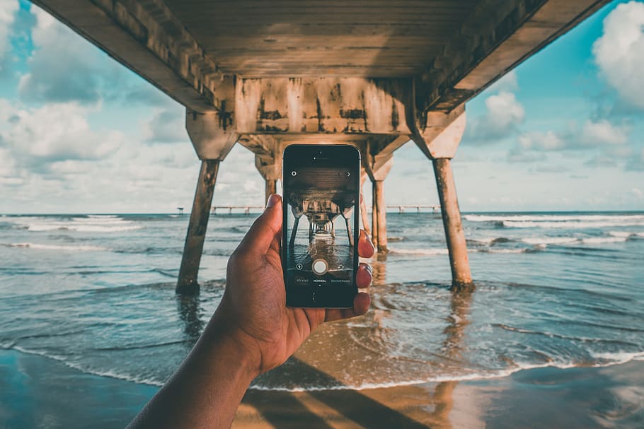sea, sky, beach, hand, camera, clouds, dock, fingers, ocean, photography HD wallpaper