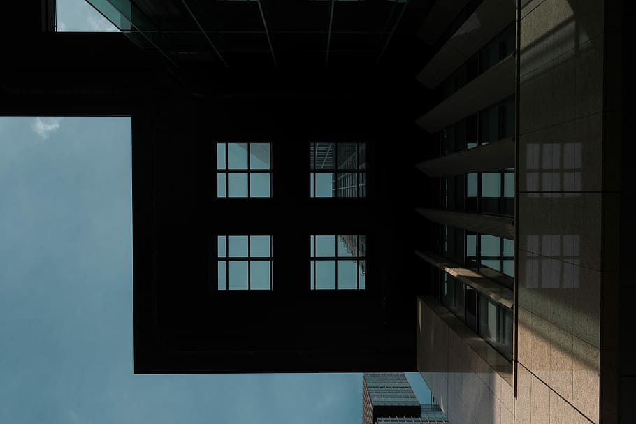 worm view of building under blue sky, brown and black painted building HD wallpaper