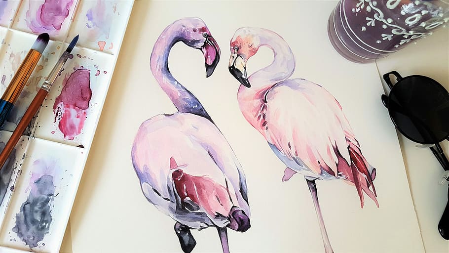 purple and pink flamingo paintings beside paint brushes, art
