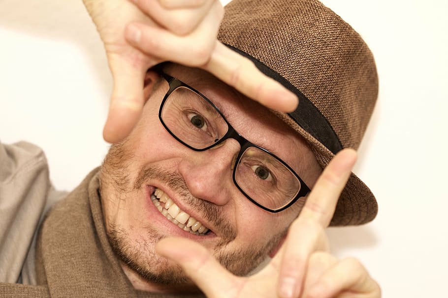 smiling man taking selfie, hat, finger frame, joy, male, portrait HD wallpaper