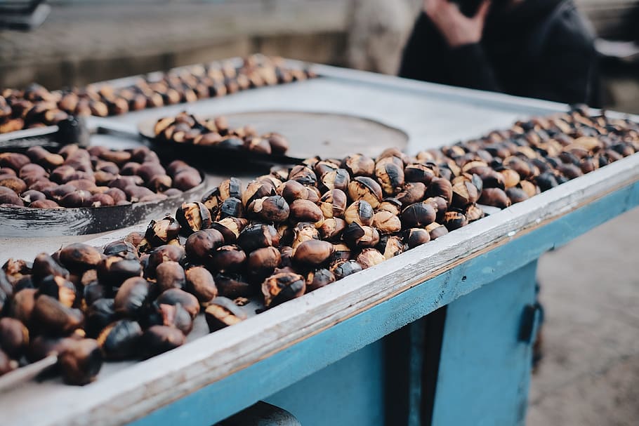 brown and black coffee beans on table, nuts on blue cart, hawker HD wallpaper