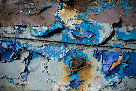 Close-up shot of some cracked and degraded blue wood. Image captured in Faversham, Kent, England with a Canon DSLR HD wallpaper