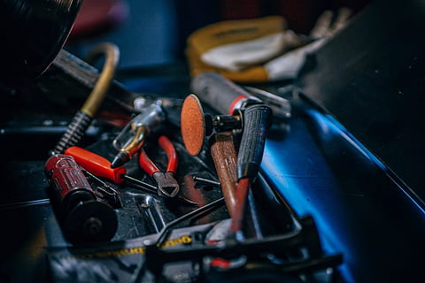 power tools on case, shallow focus photography of brown and black hand tools HD wallpaper