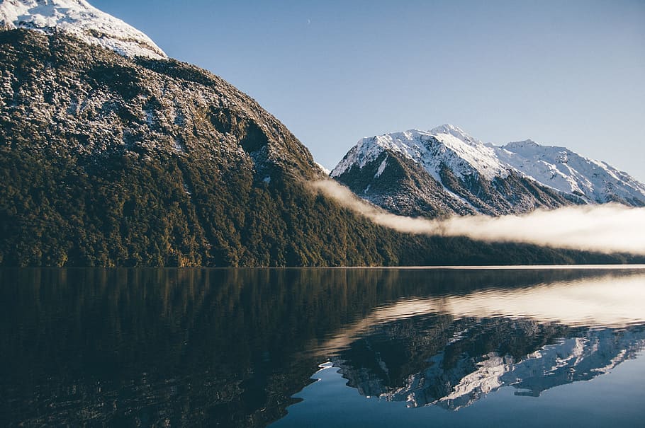 mountain reflecting on body of water, mountains and body of water during daytime HD wallpaper