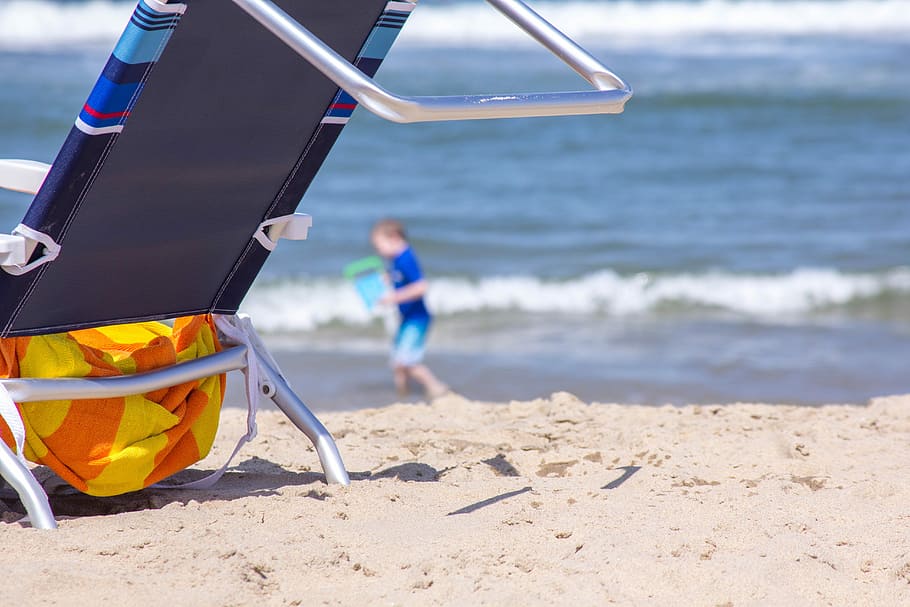 Beach, Chair, Sand, Ocean, playing, one person, sea, one man only HD wallpaper