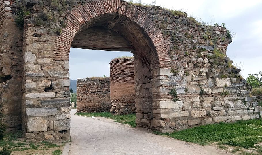 ancient brick gate, portcullis, road