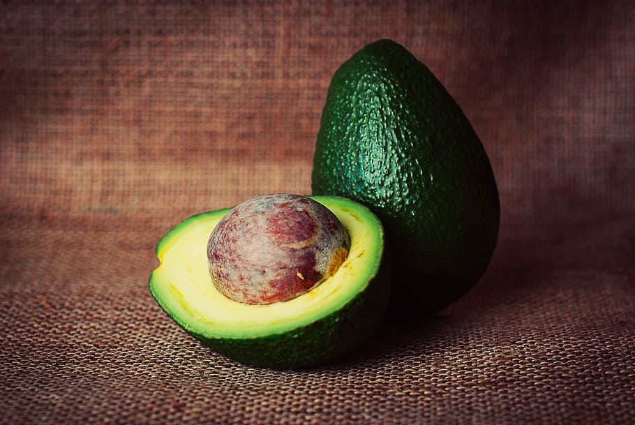 sliced and whole green avocados, vegetable, cut, half, pit HD wallpaper