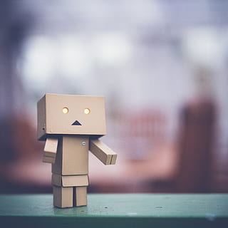 brown cardboard Danbo robot on green surface, sad, art, box HD wallpaper