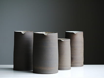 four gray jar on white surface, four brown vases, pottery, vessel HD wallpaper