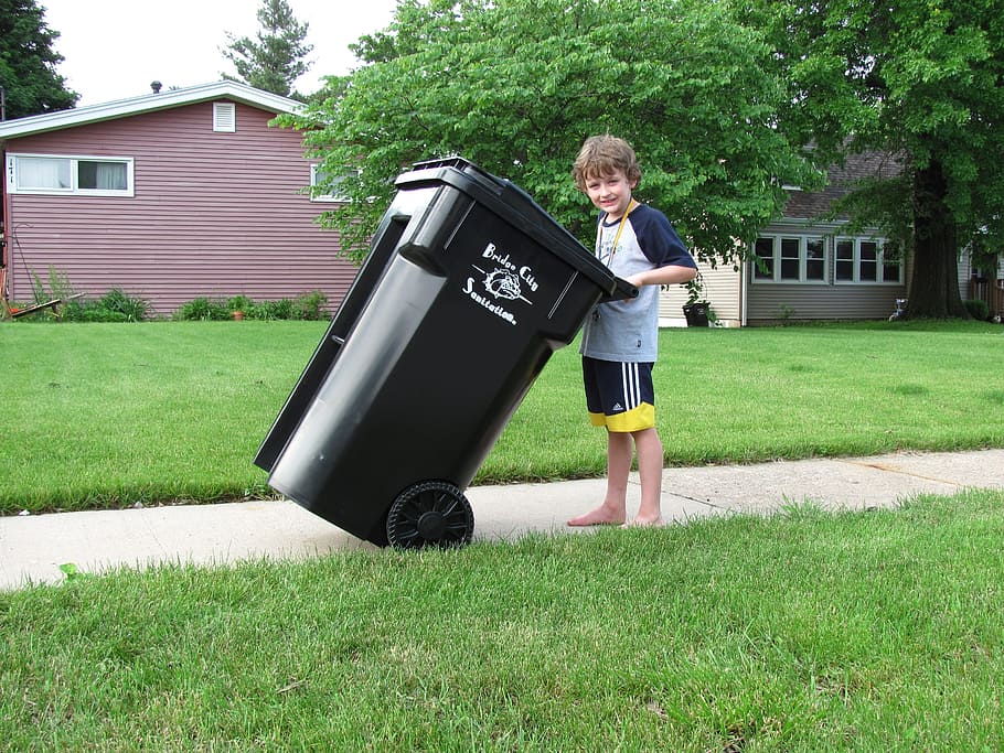 boy holding black trash bin near house, waste, trashcan, waste management, HD wallpaper