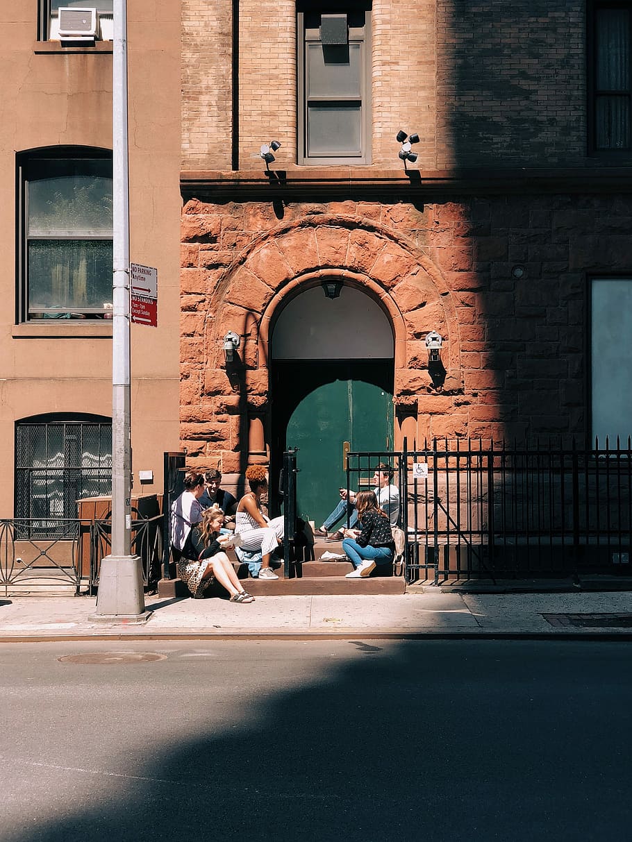 people sitting in front of door, group of people sitting outside the door HD wallpaper