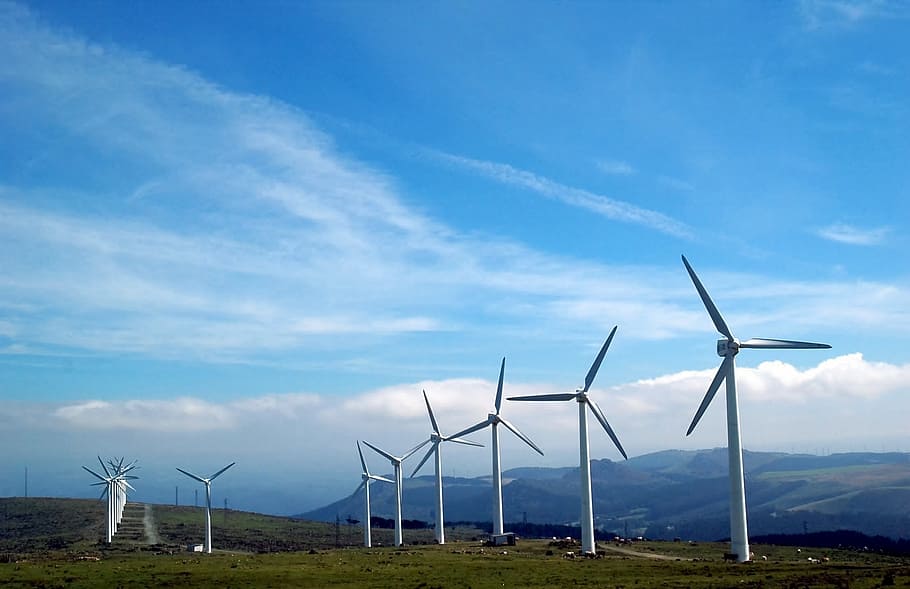 windmills at landscape field, cape ortegal, galicia, renewable energy